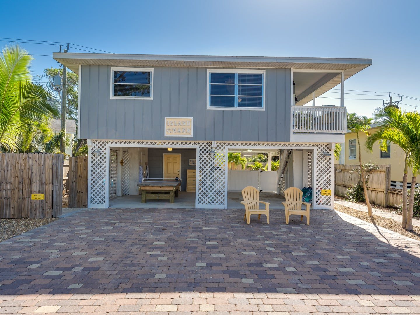 Island Charm pool home exterior